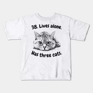 38. Lives alone. Has three cats. Funny Kids T-Shirt